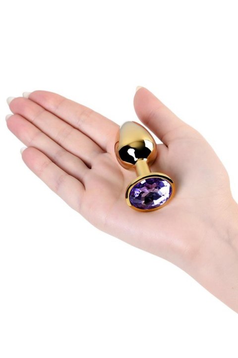 Golden anal plug TOYFA Metal,with a amethyst colored gem