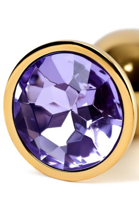 Golden anal plug TOYFA Metal,with a amethyst colored gem